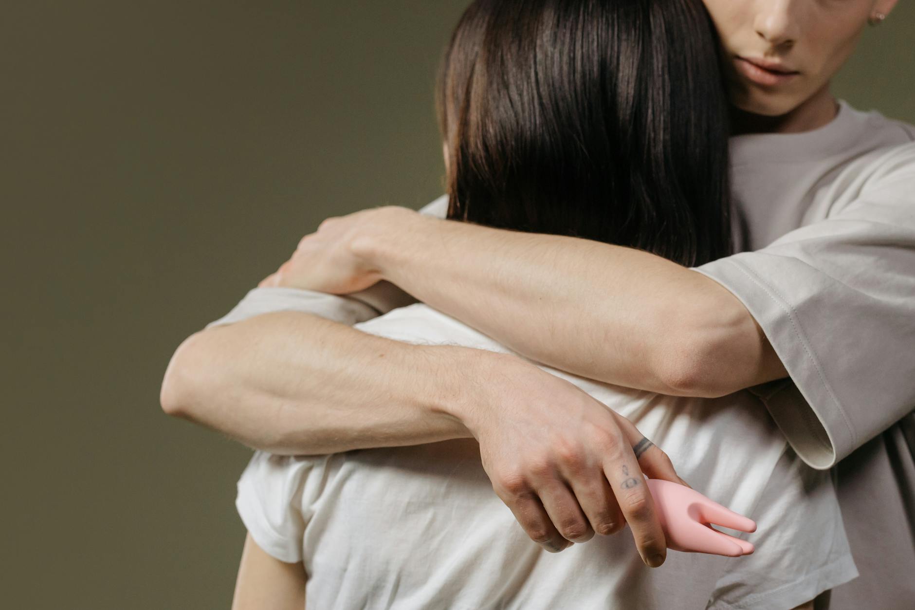 A couple embracing closely, highlighting emotional intimacy and connection in relationships